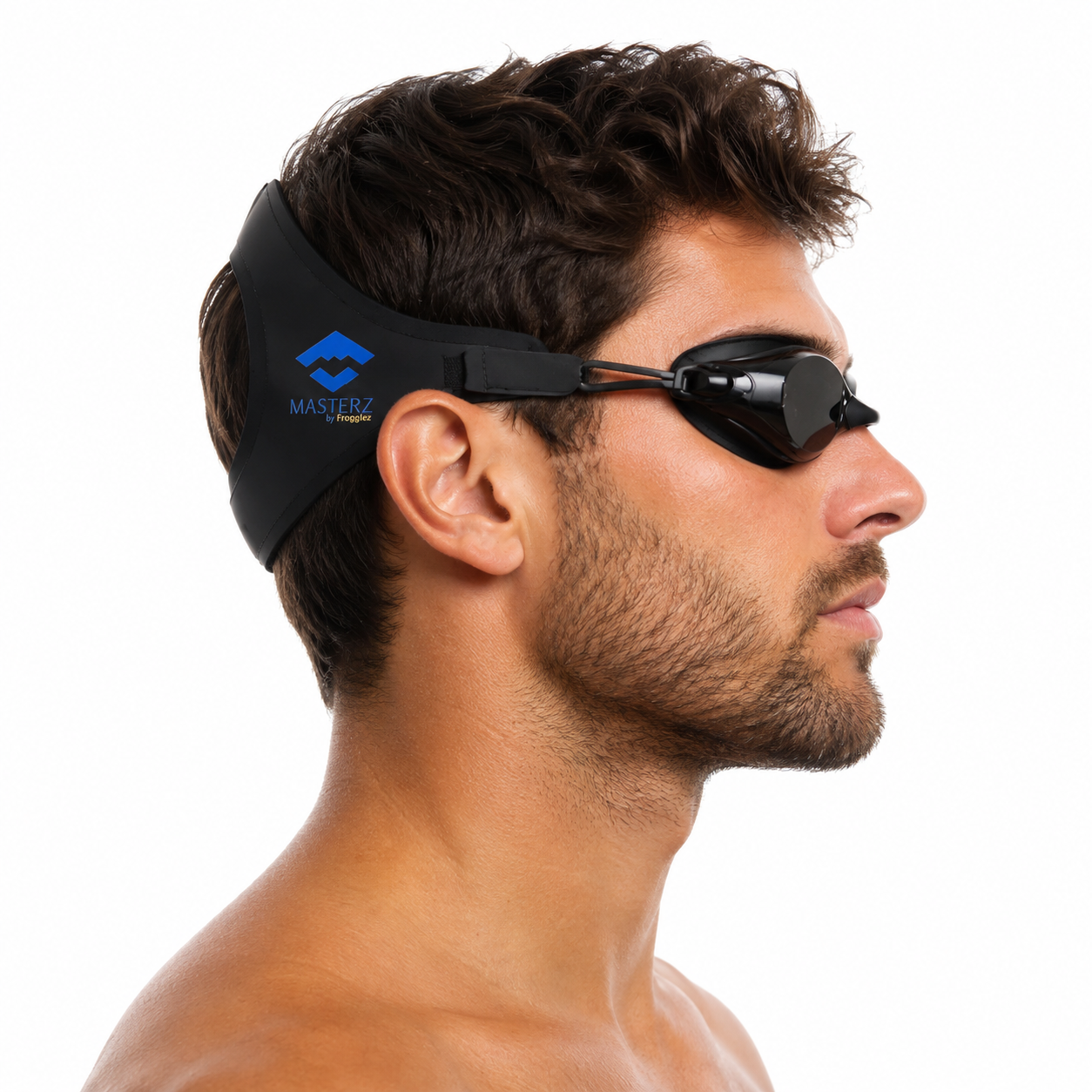 A man in profile wearing black Masterz swim goggles with a black headband featuring a blue logo, against a solid white background.